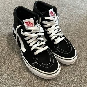 Women’s size 7.5 Black Vans (or men’s 6.0)